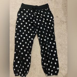 Black with silver sparkly skulls! Size Medium